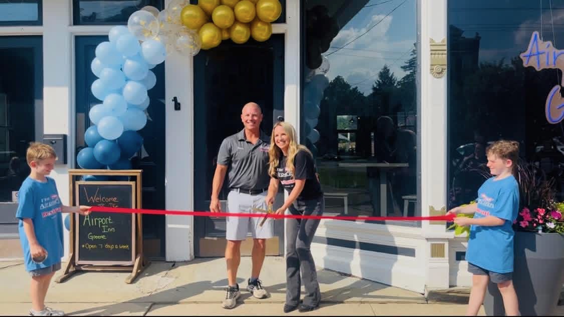 Ribbon cutting at The Airport Inn Greene
