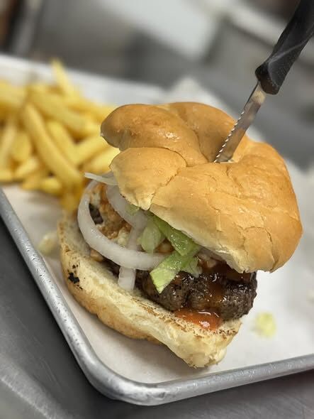 BBQ burger with onion rings and fries