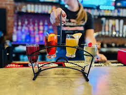 Colorful mimosa flight at the bar