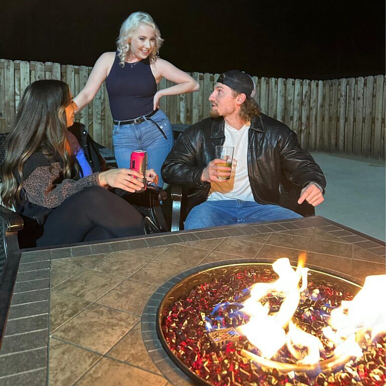 Fire pit gathering at night